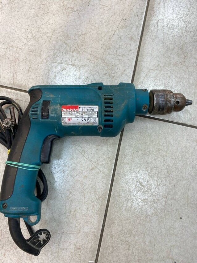 Ударная дрель Makita HP1620